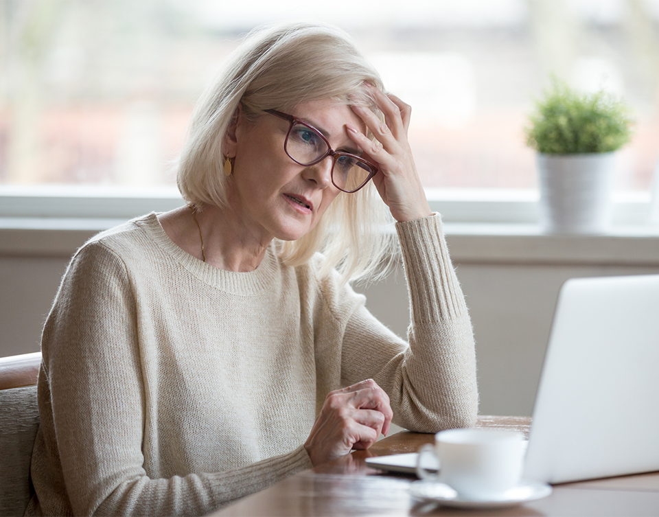 confused woman at computer